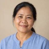 คุณศศิธร เจ้าของสวนลำไย ตำบลแม่เงิน อำเภอเชียงแสน