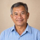 คุณชาญวิทย์ เจ้าของโรงสีข้าว อำเภอแม่จัน