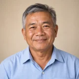 คุณสุรพล เจ้าของโรงสีข้าว อำเภอแม่ลาว